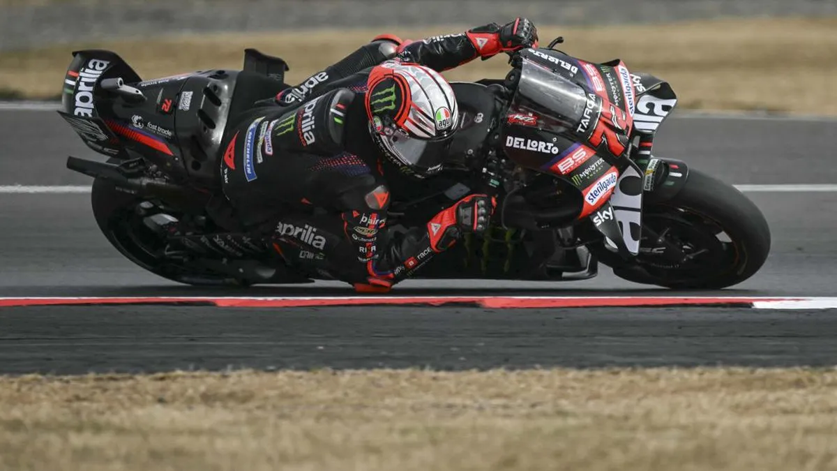 Motorcycle racing circuit with kerbs and gravel run-off areas