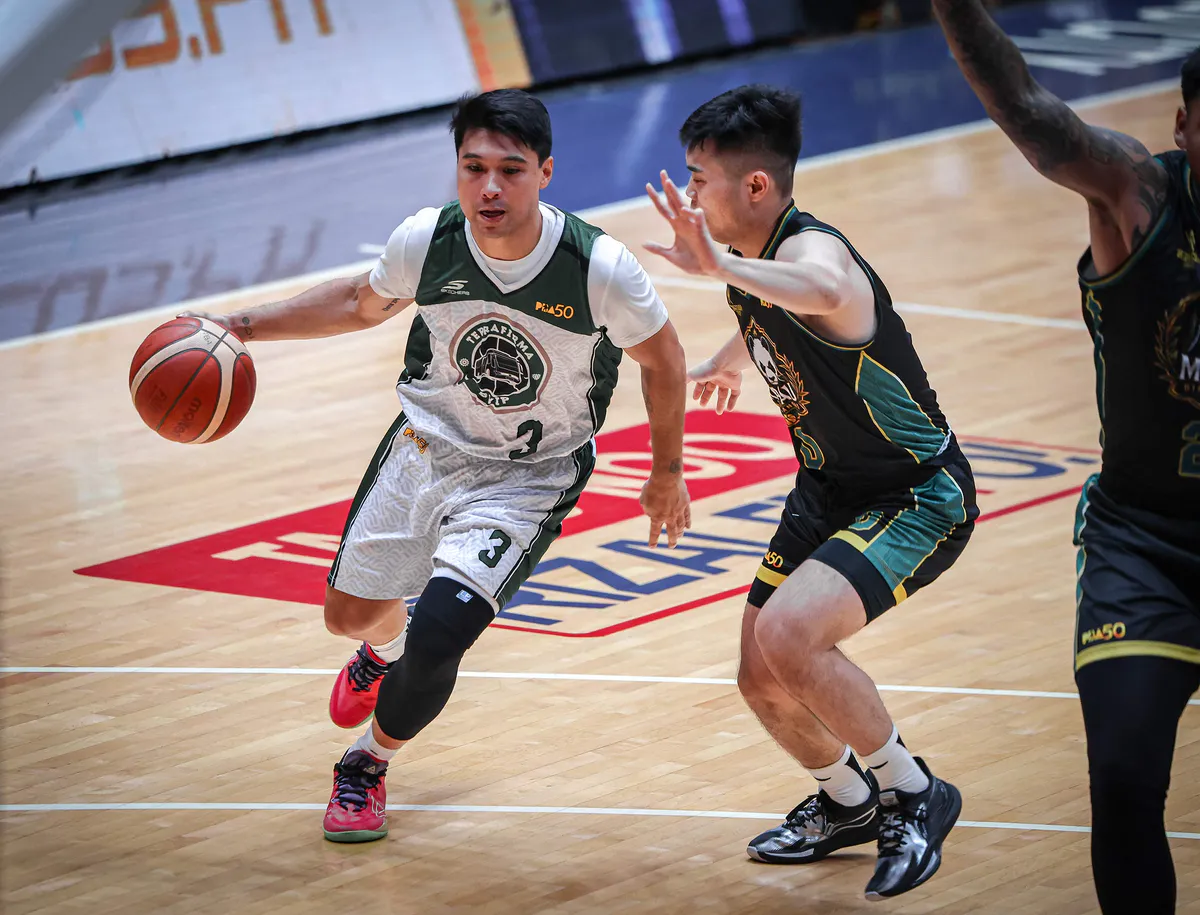Basketball and hoop on an indoor court