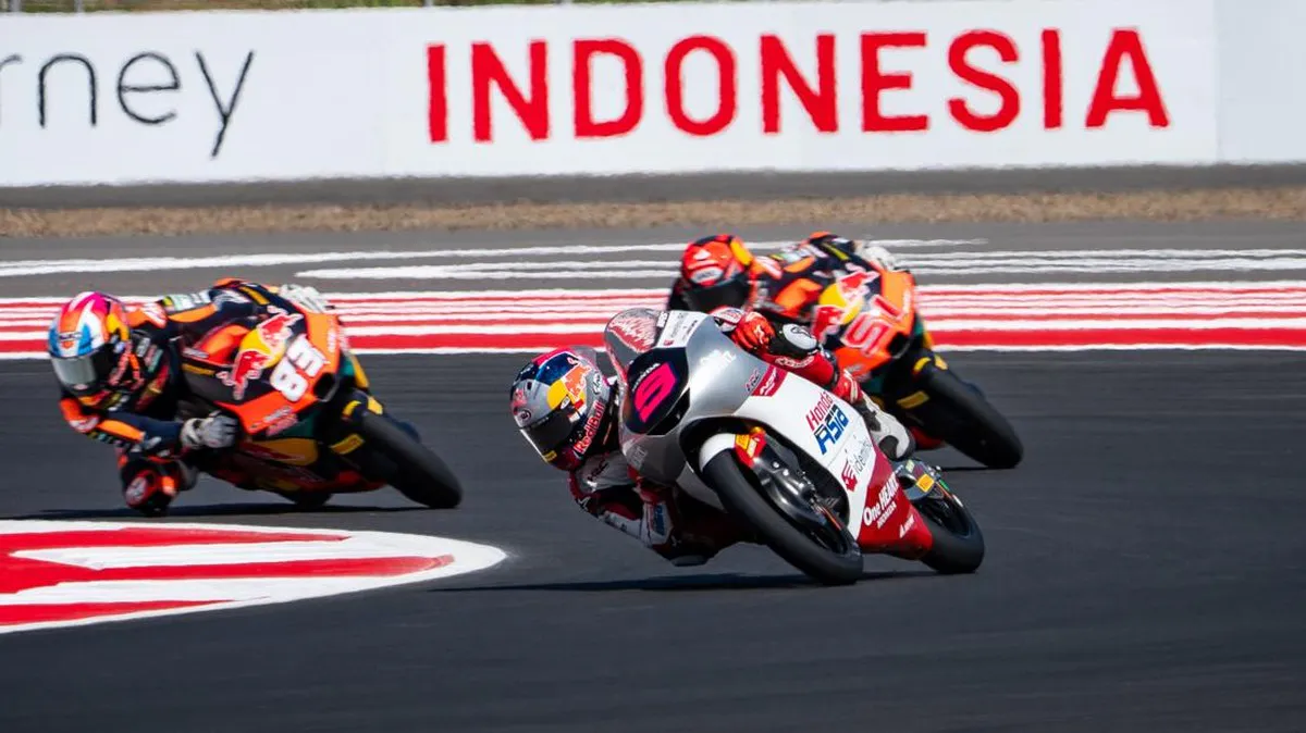 Motorcycle racing circuit with kerbs and a chequered flag