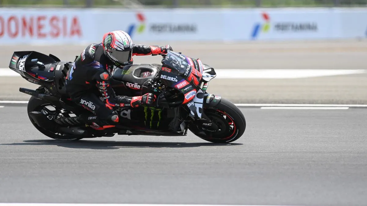 Motorcycle racing circuit with kerbs and a grandstand