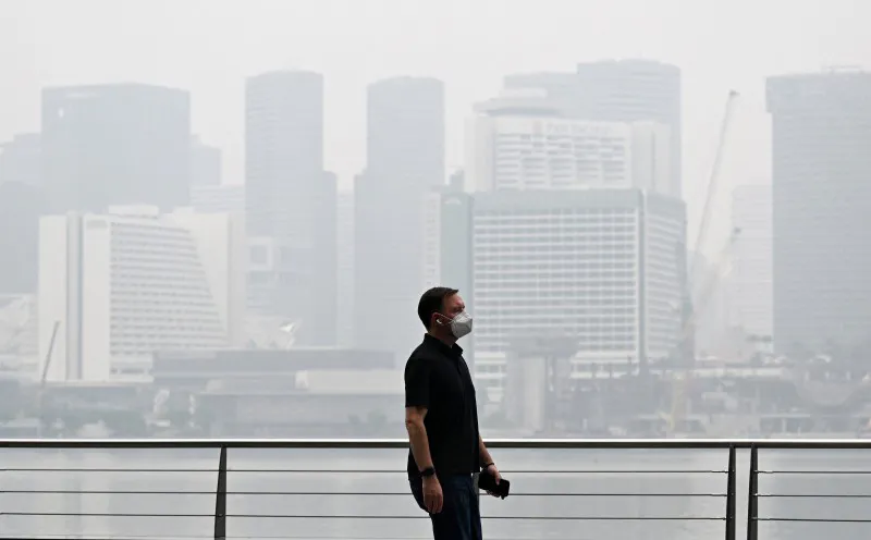 City buildings obscured by haze