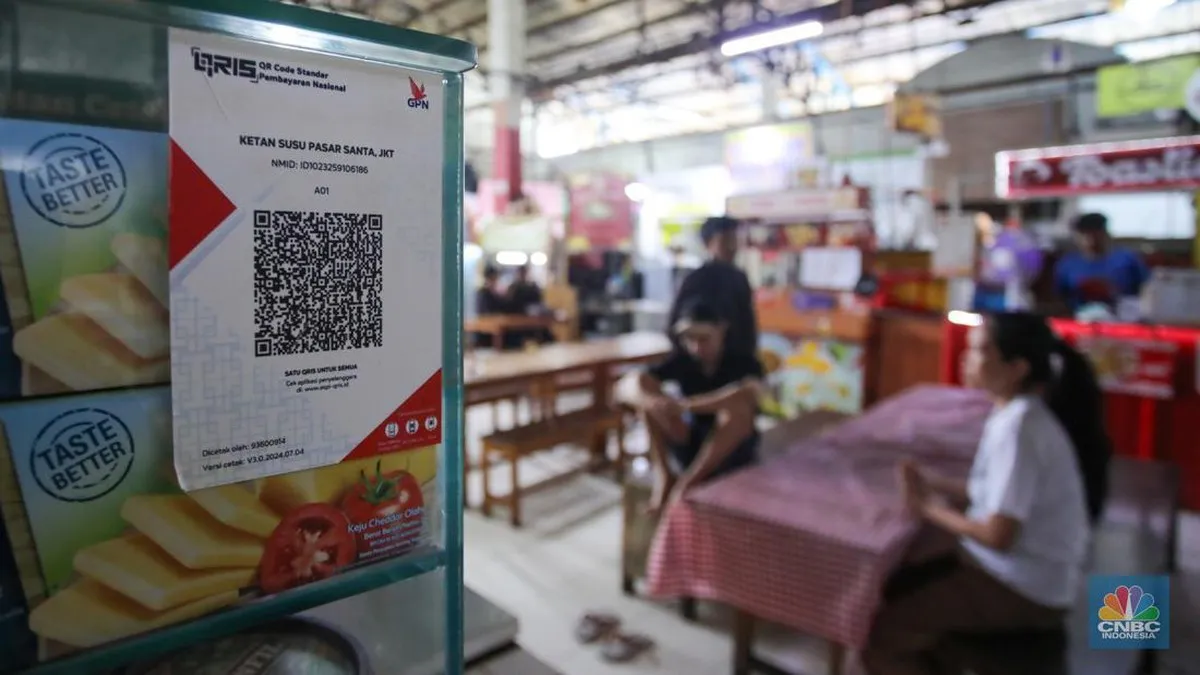 Illustration of a QR payment code beside a smartphone