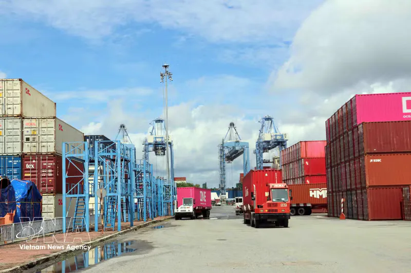 Shipping containers stacked at a cargo port