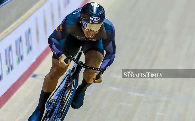 Track bicycles on the banked surface of an indoor velodrome