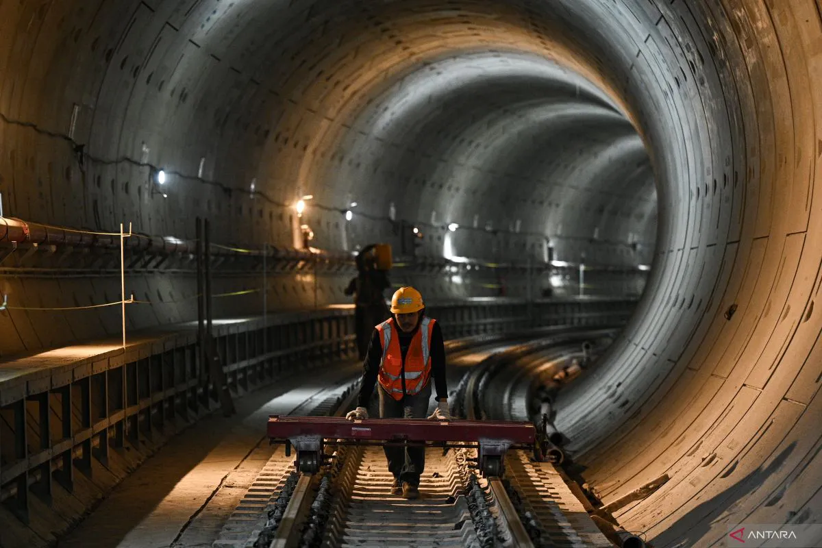 Underground railway construction with an area set aside for archaeological excavation