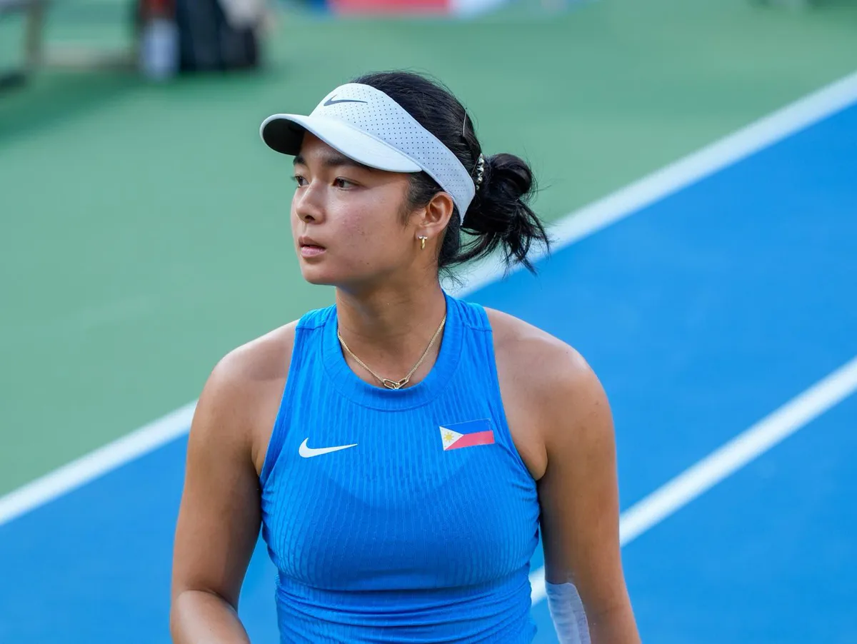 Tennis racket and ball on a court