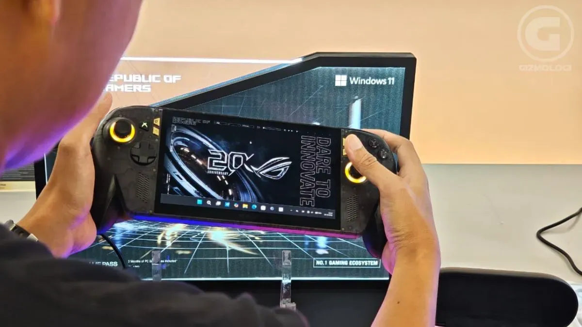 Illustration of a handheld gaming PC with accessories