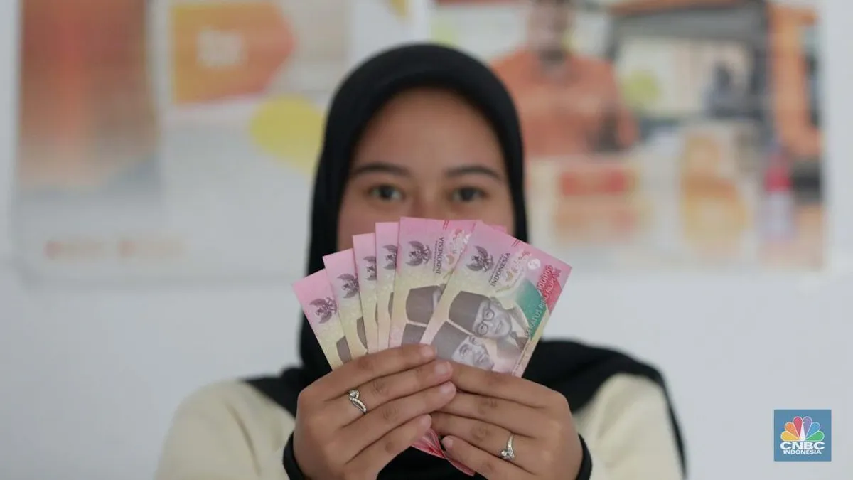 Indonesian rupiah banknotes arranged on a table