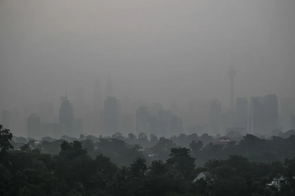A city skyline obscured by thick haze