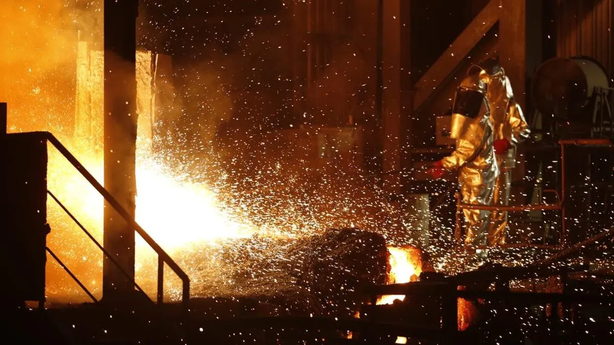 Industrial processing facilities with metal pipes and smokestacks