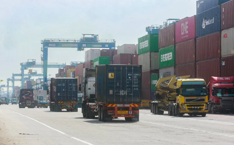 Shipping containers stacked at a cargo port