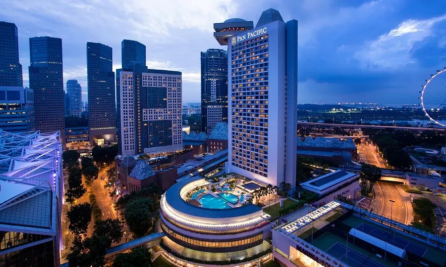 Hotel buildings and a swimming pool in a Southeast Asian city