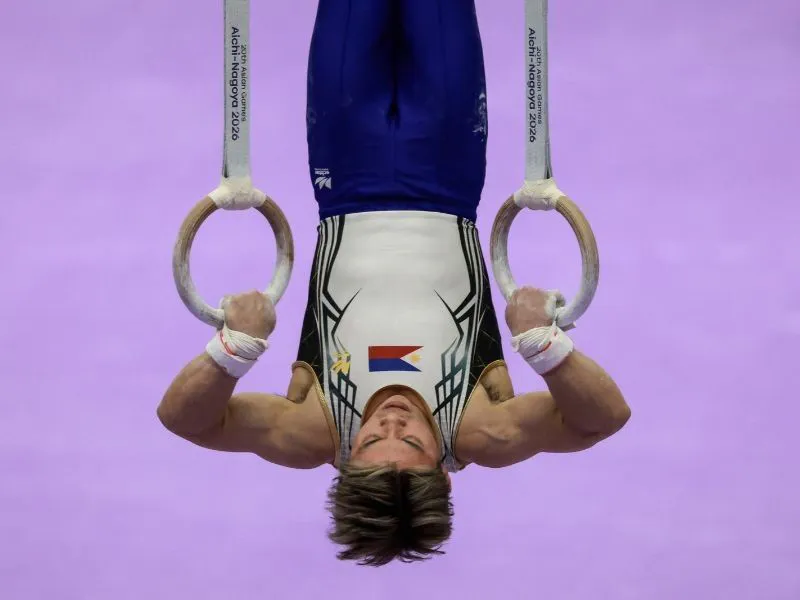 Floor exercise area and vault apparatus in an indoor gymnastics arena