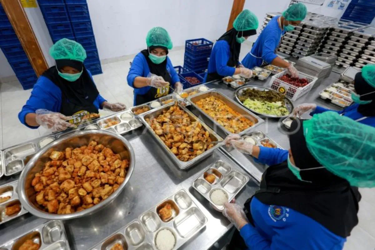 Trays of prepared meals arranged on a kitchen counter