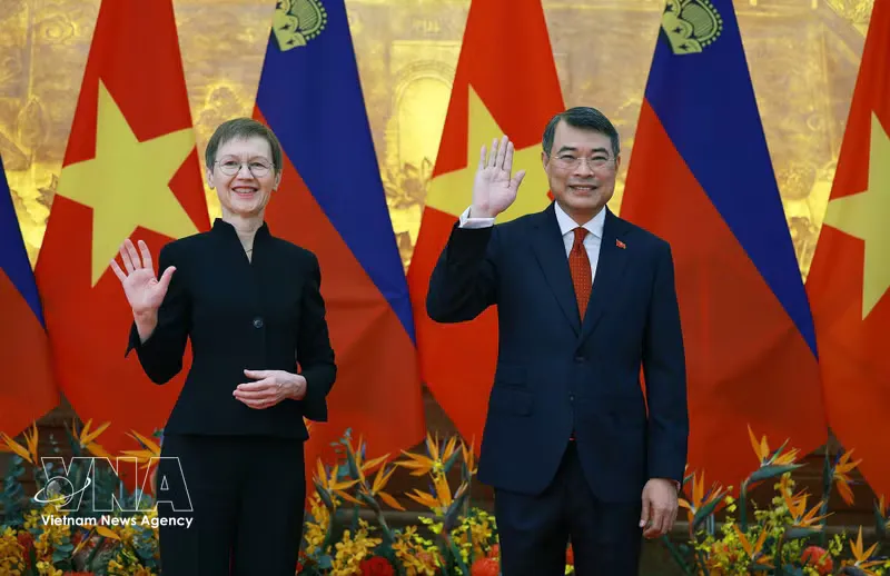 Vietnamese and Liechtenstein flags displayed side by side