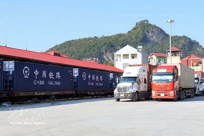 Illustration of freight vehicles approaching a border customs checkpoint