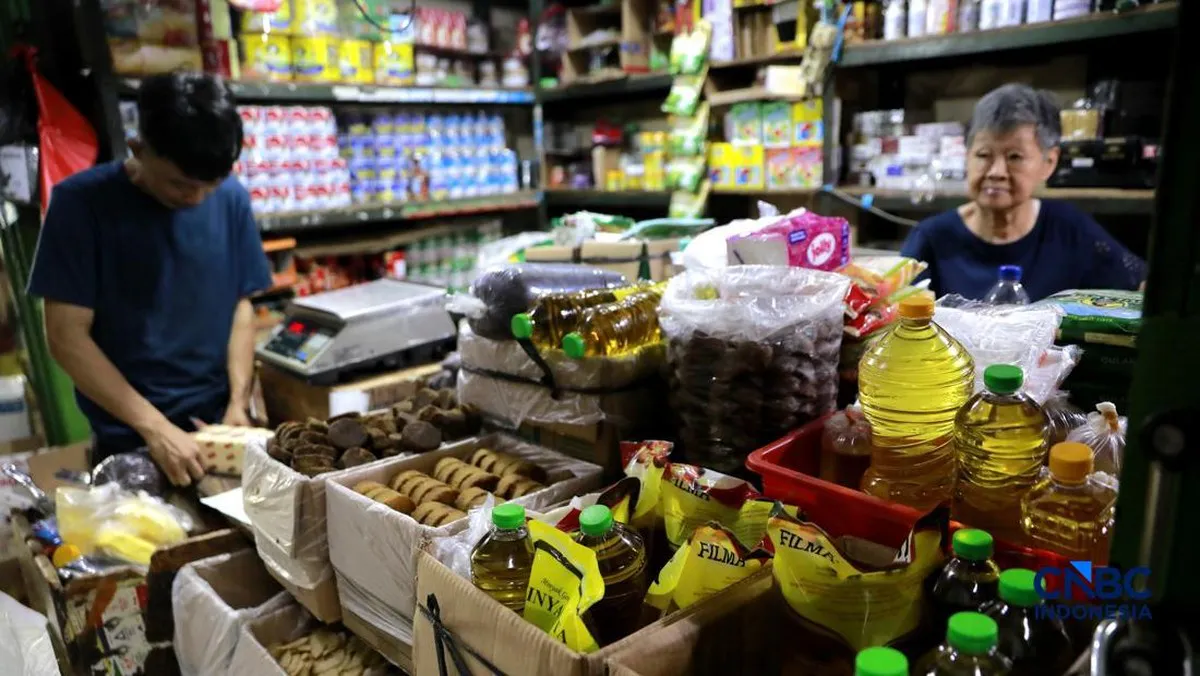Rice, vegetables and other food staples displayed at a market