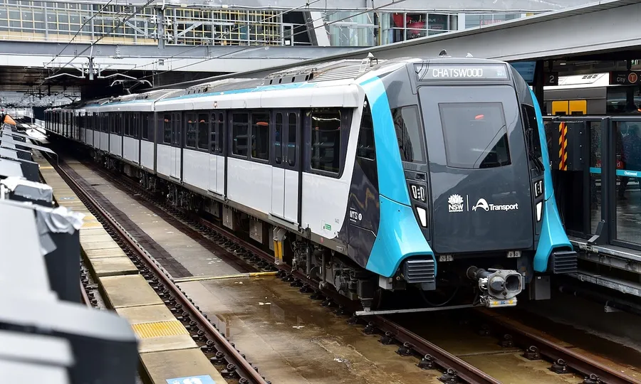 Metro train carriages alongside a station platform
