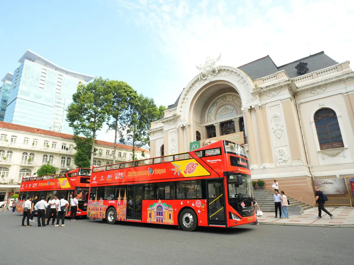 Illustration of a double-decker sightseeing bus on an urban street