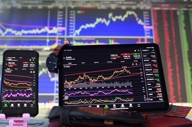 Stock market price board displaying share prices and trading figures