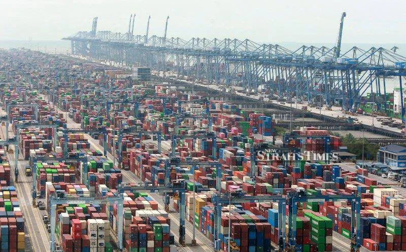 Shipping containers stacked at a cargo terminal