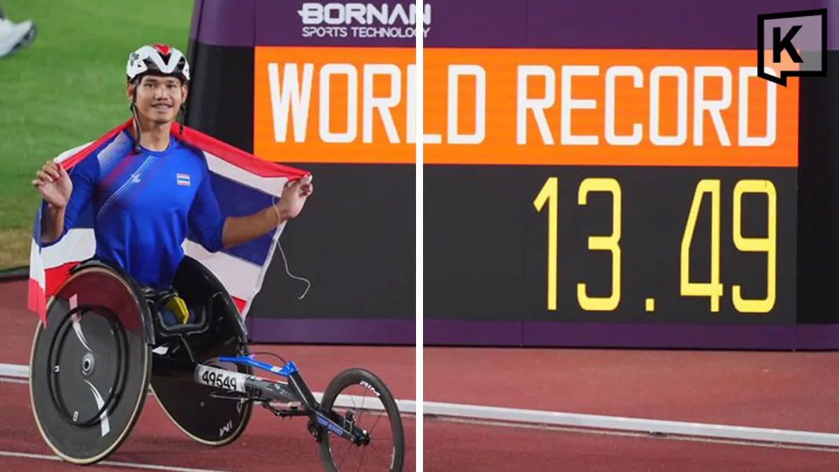 Racing wheelchair beside the marked lanes of an athletics track