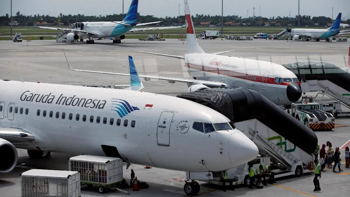 Passenger aircraft parked at an airport terminal