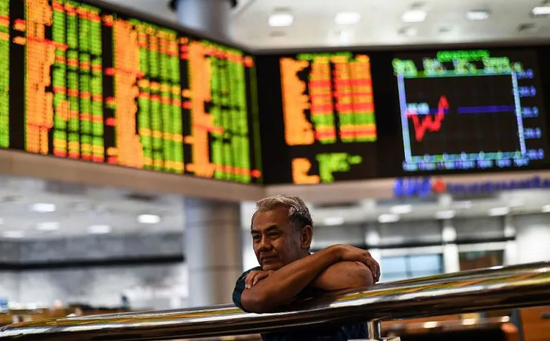 Stock market price board displaying share prices and index movements