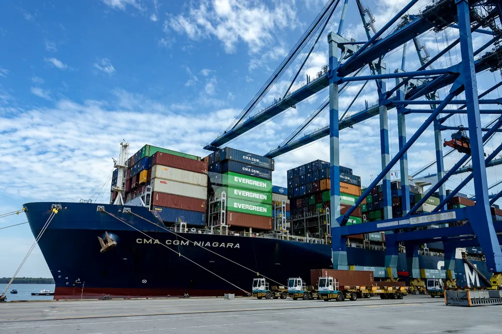 Shipping containers and cranes at a Malaysian port
