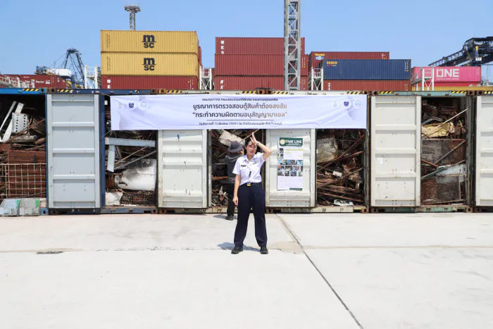 Shipping containers stacked at a cargo terminal