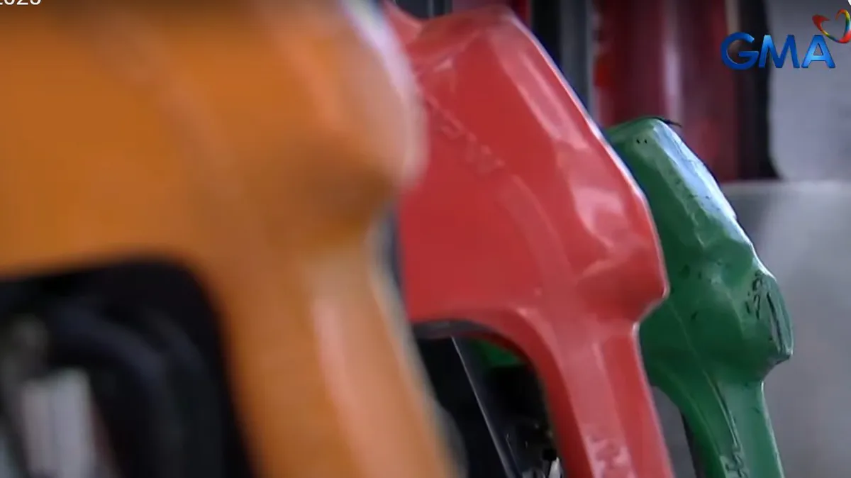 Fuel pump nozzles at a petrol station