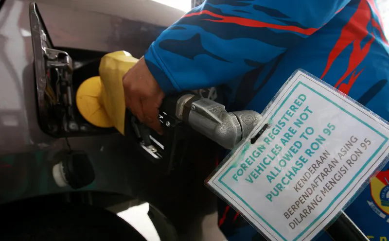 Petrol pumps at a filling station in Malaysia