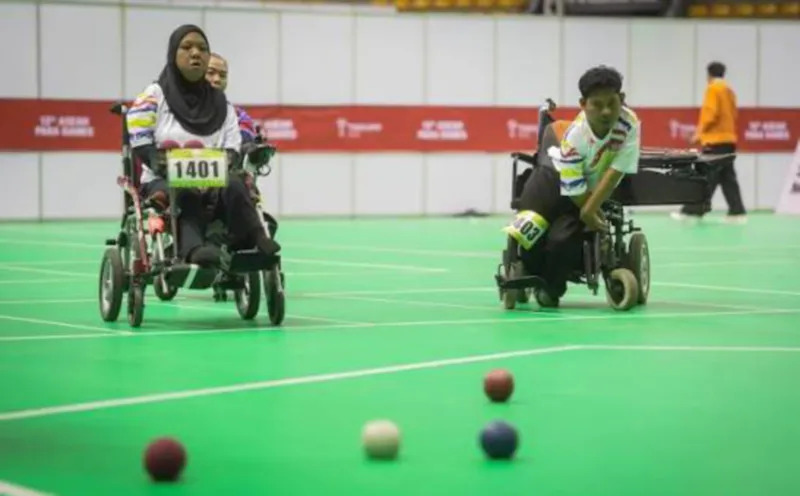 Boccia balls arranged on an indoor court