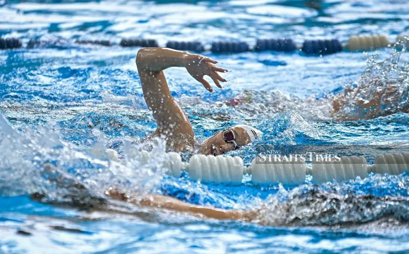 Lane ropes and starting blocks at an indoor swimming pool
