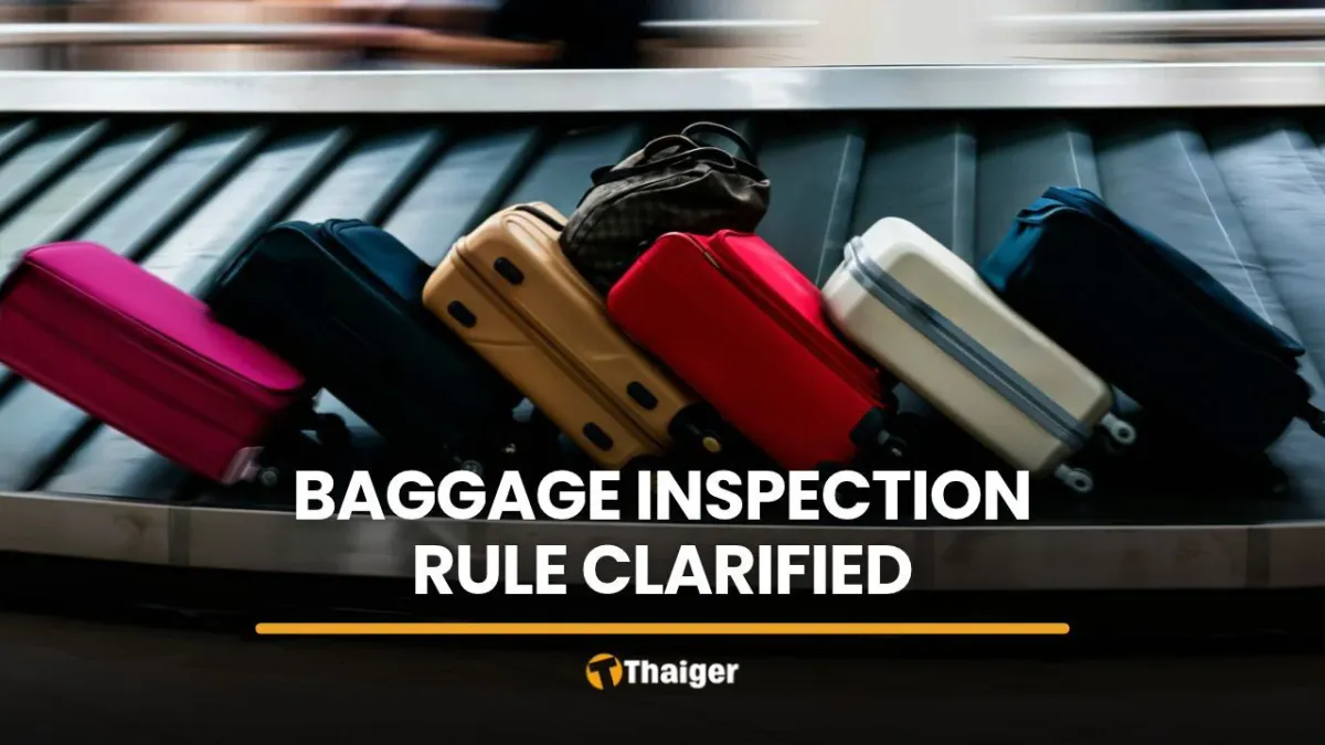 Checked luggage moving along an airport baggage conveyor