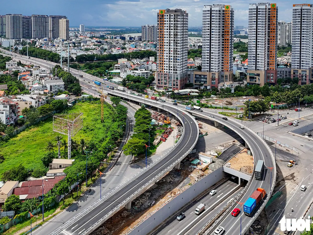 Traffic moving through an urban road junction in Ho Chi Minh City