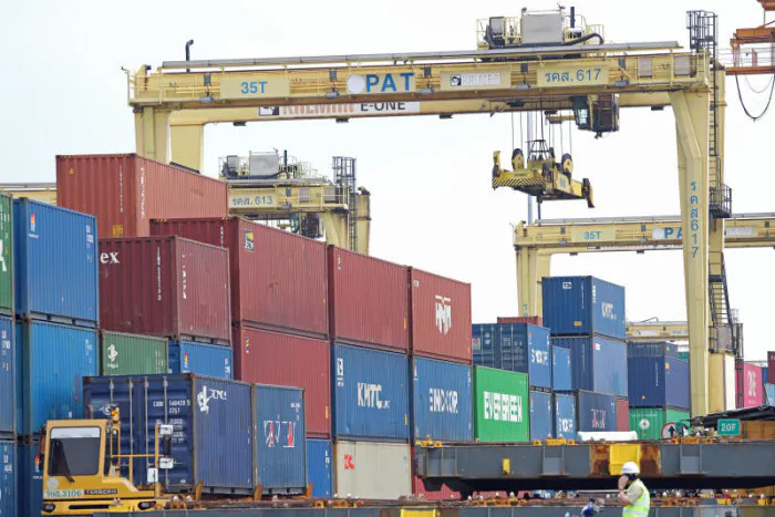 Shipping containers stacked at a cargo terminal