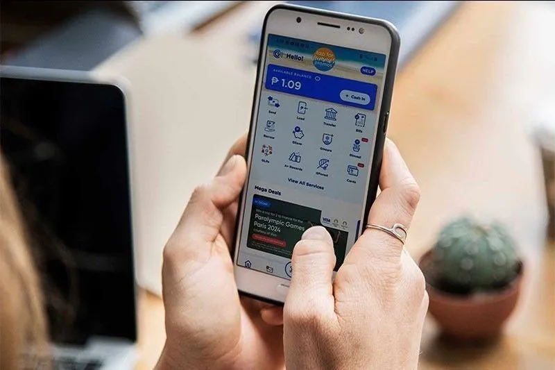 Smartphone displaying a financial app beside a stock price chart