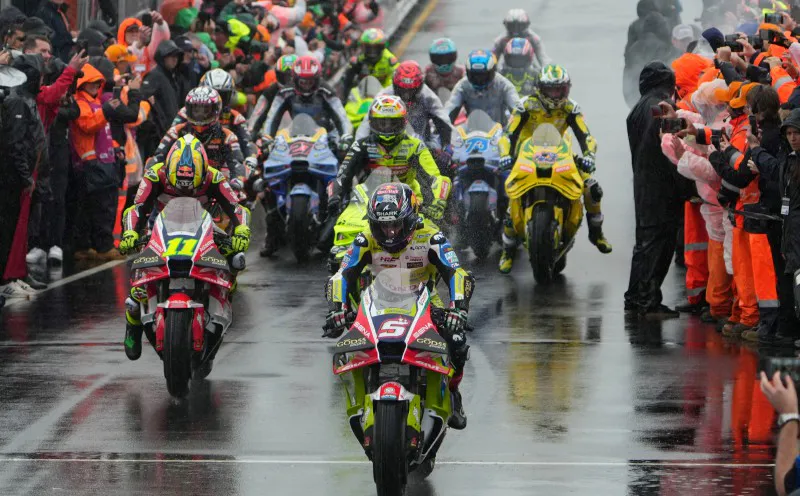 Motorcycle racing circuit with track markings and spectator stands