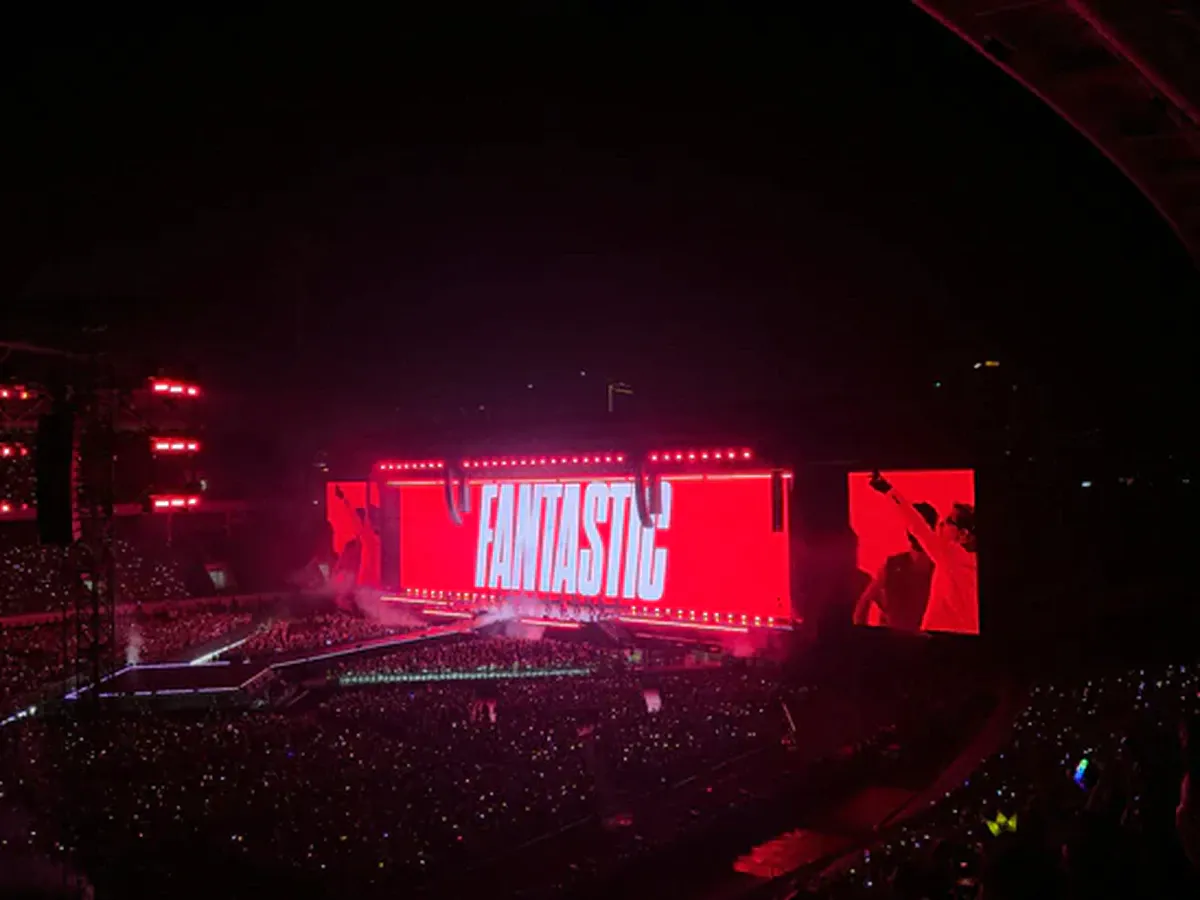 Concert stage and seating inside a large stadium