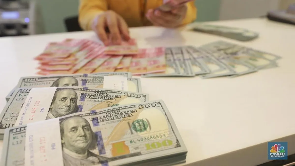 Indonesian rupiah banknotes arranged on a desk