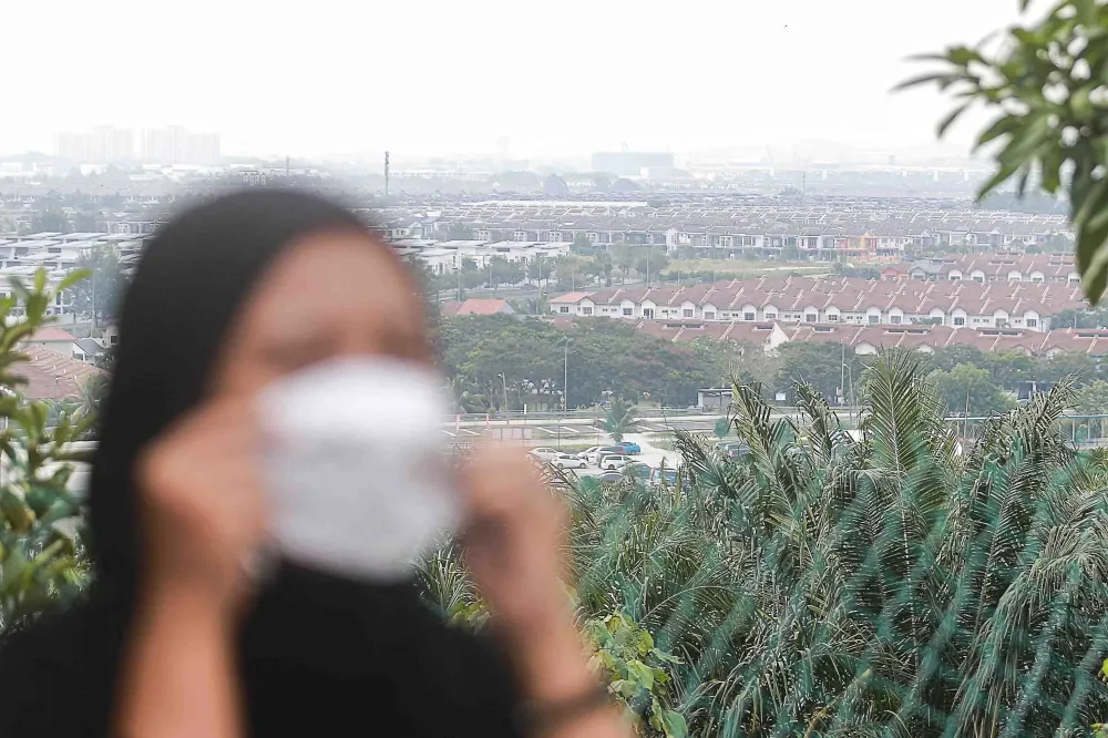 Hazy skyline above an urban industrial area