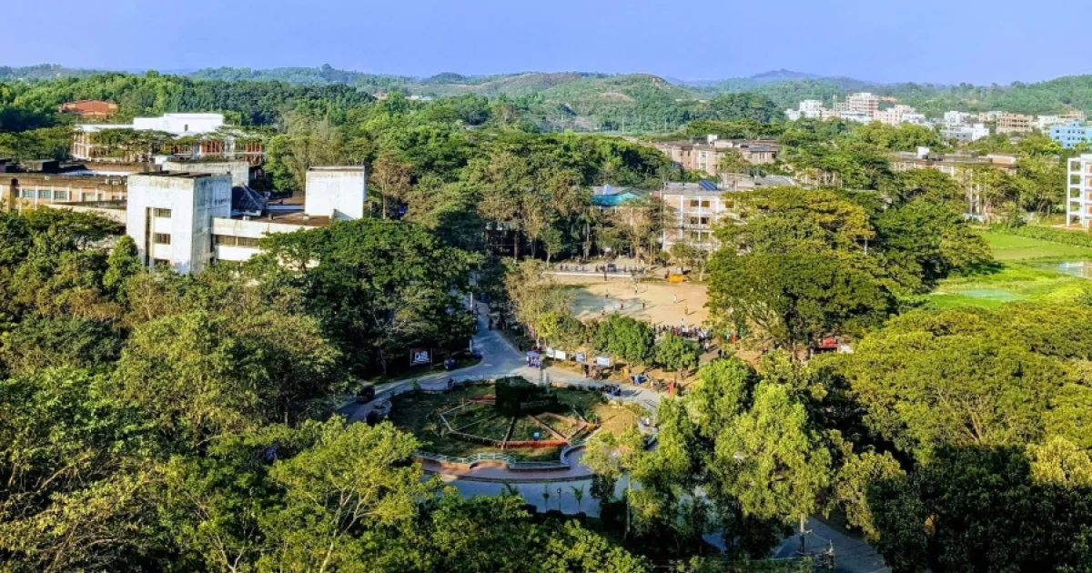 Green woodland alongside residential buildings in Singapore