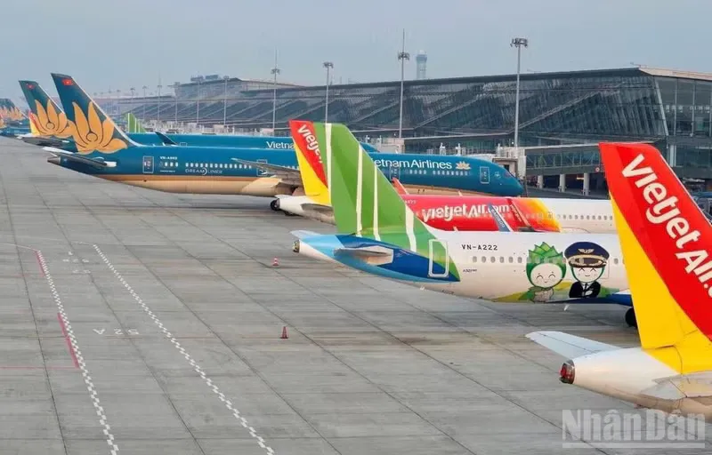 Passenger aircraft parked beside an airport terminal
