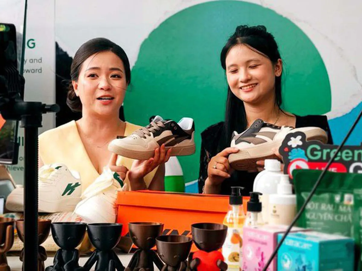 Online shopping interface on a smartphone beside packaged goods