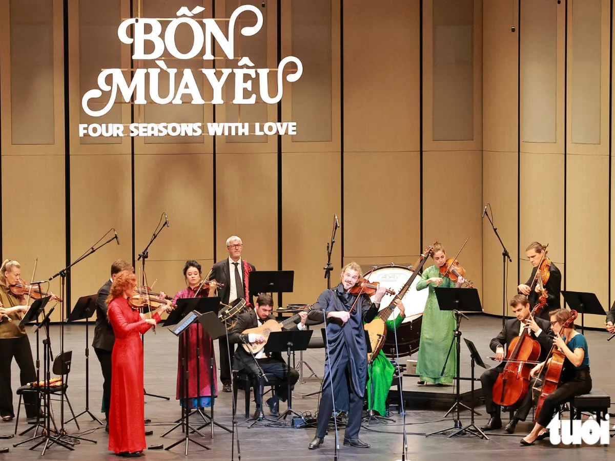 String instruments and music stands arranged on a concert hall stage