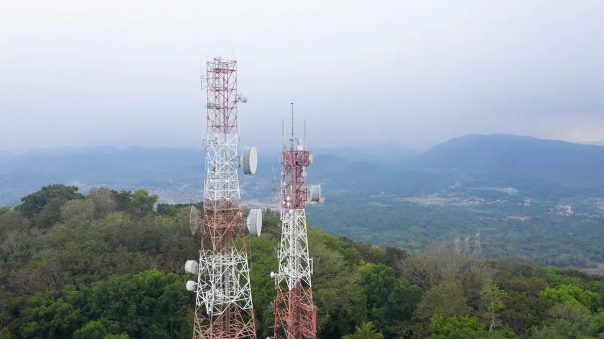Telecommunications tower with antennas and network equipment