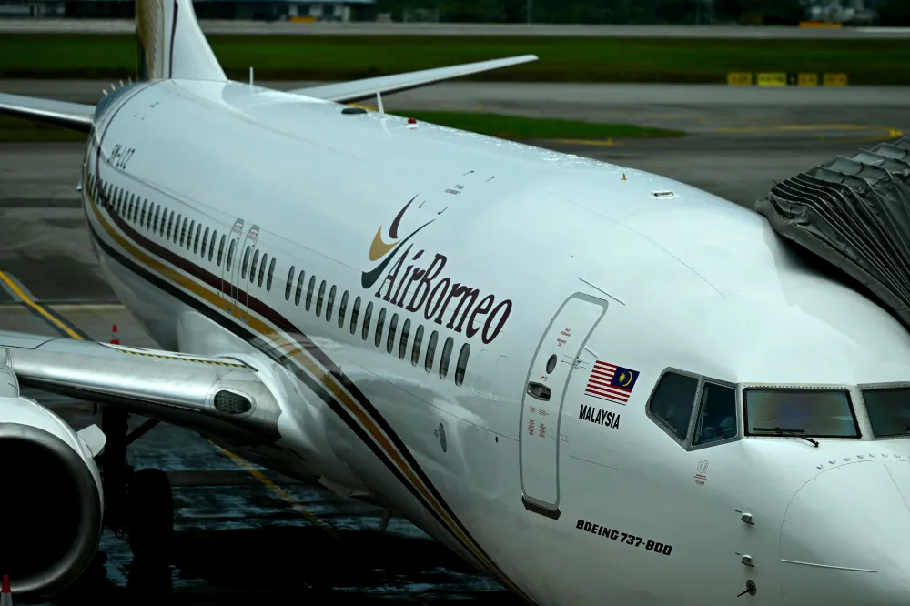 Passenger aircraft parked beside an airport terminal