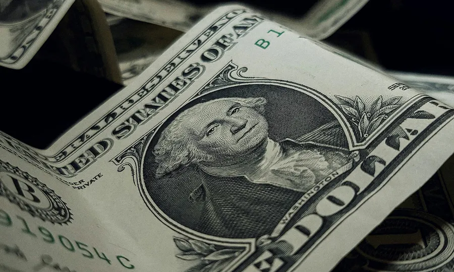 Vietnamese dong and US dollar banknotes