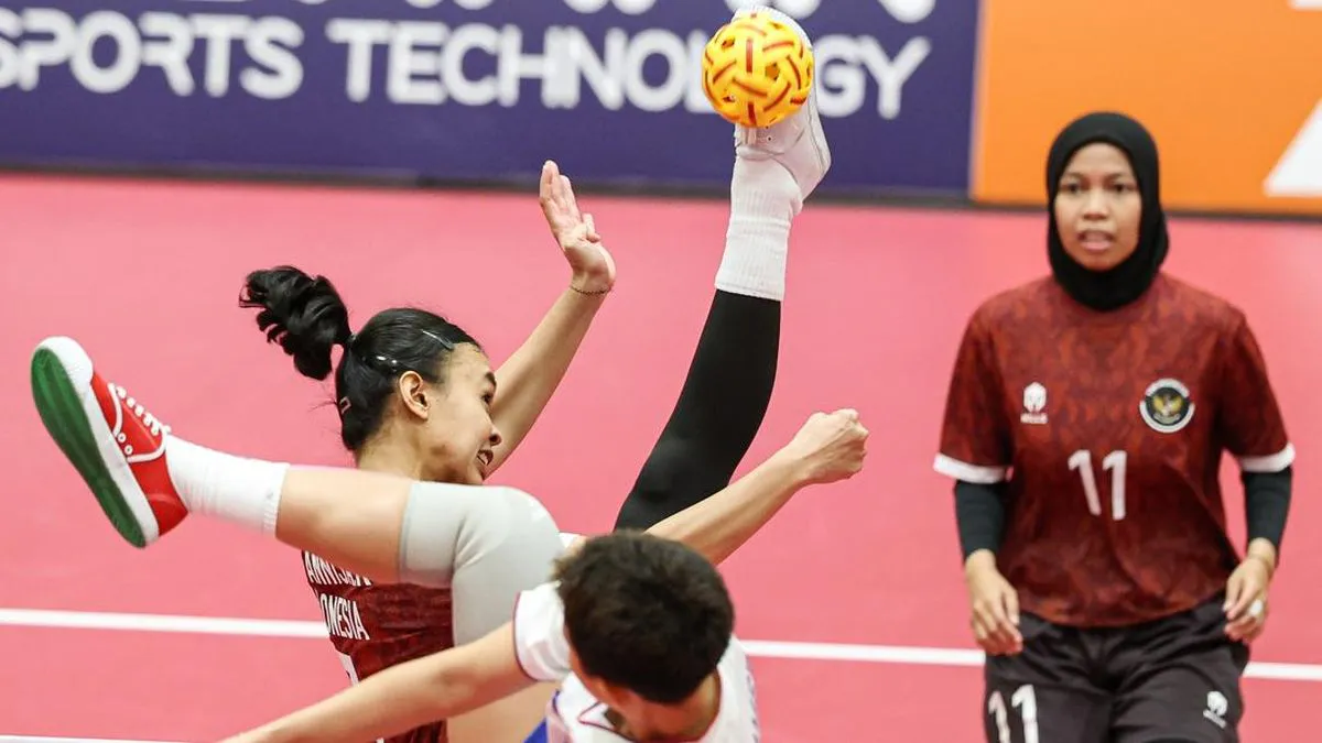 Sepak takraw ball beside a court net